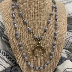 Purple crescent beaded necklaces